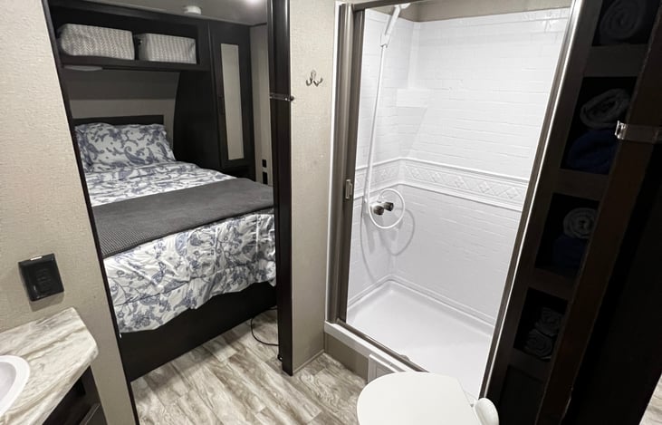 Large bathroom with full size shower