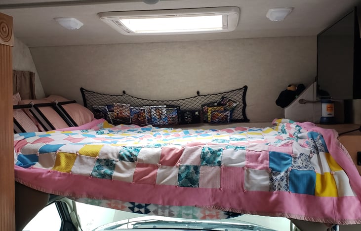 Cab over bed with 32" smart tv.