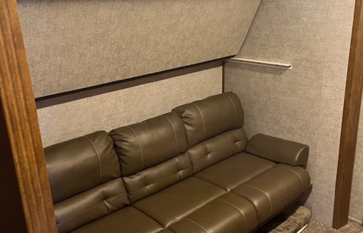 Sofa in middle bunkhouse.  Has bunk overhead and trundle underneath.