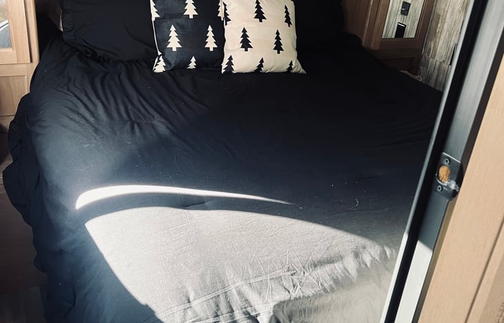 Queen Bed in private bedroom.