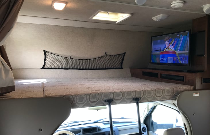 Cab over bed in the folded down position for sleeping 2 comfortably.