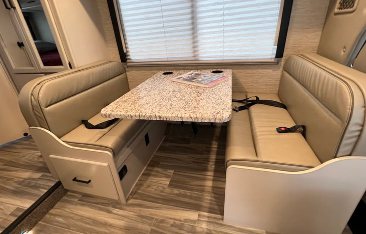 Dream dinette.  4 seatbelts here, incl hook for toddler seat
