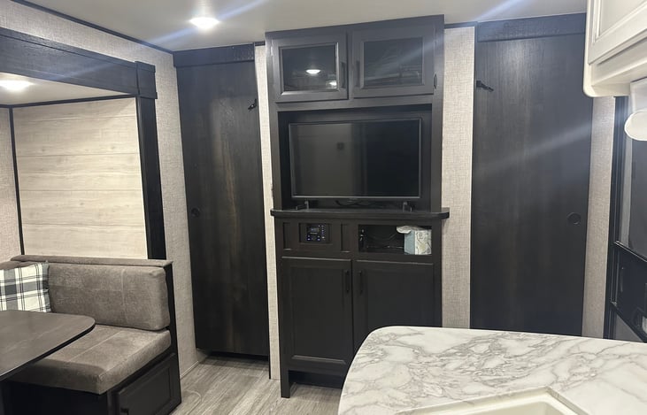 Smart TV. Log into your streaming services. Don't forget your hotspot or log into campsite wifi.