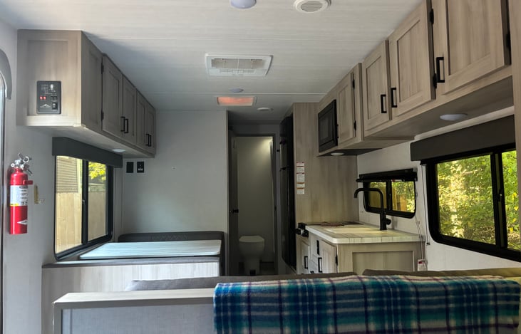 Open floor with curtains to close off beds