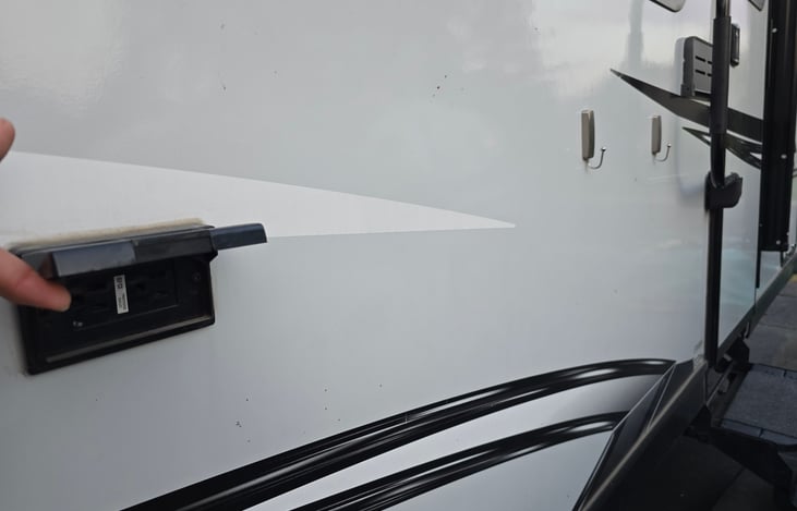 Outside outlet, small shelf, small hooks