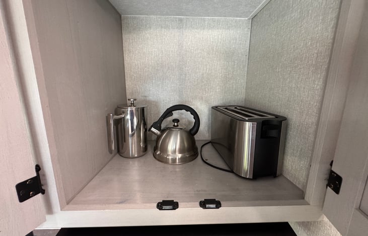 Toaster, French press, coffee maker, and teapot