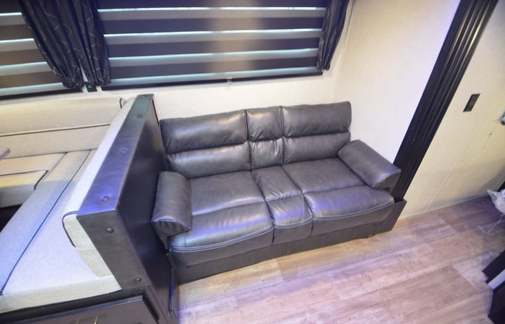 Jacknife sofa that easily converts to a full-sized bed.