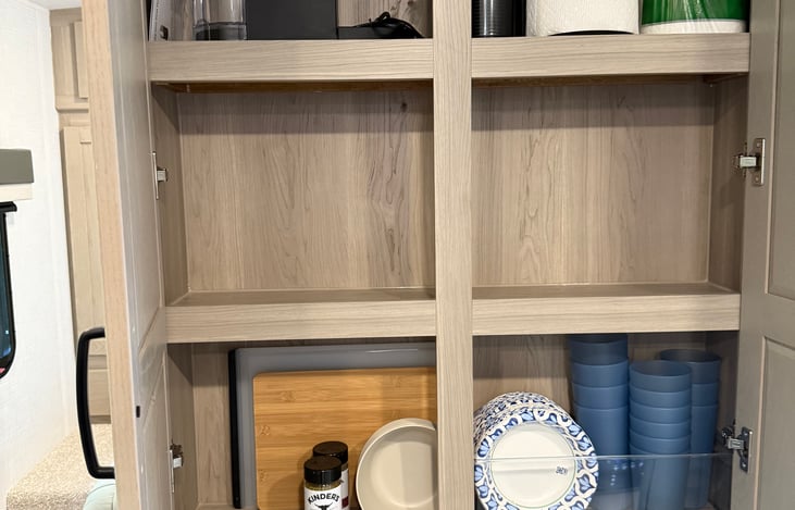 Keurig coffee maker, paper towels, cups, paper bowls, and current boards are just a few of the amenities this trailer comes with.