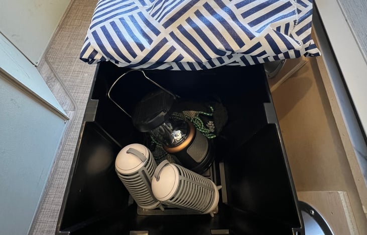 Table cloth, rechargeable lights + bug zapper, solar lantern
