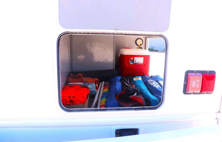 Rear end storage unit filled with camping/ rv accessories