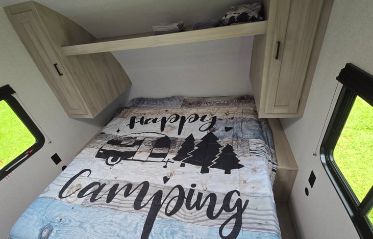 Small closet on each side, USB and standard outlets on both sides