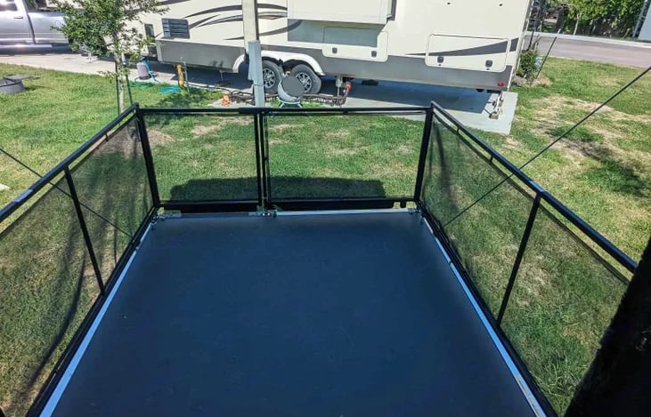 Outdoor deck with awning.  Great for people and pets!