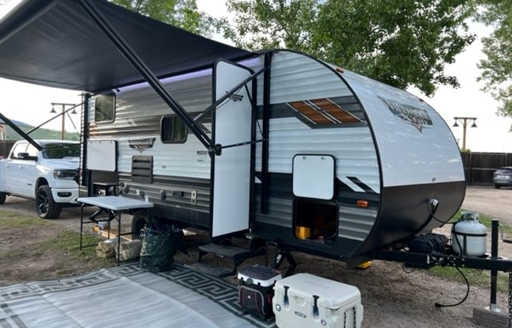 Electric awning with LED lights, large outdoor mat.