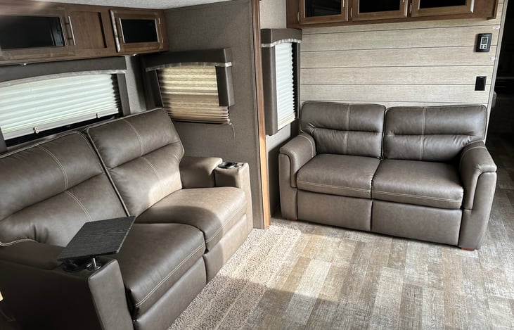 Living room area- includes heated massage love seats