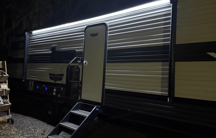 Outdoor under awning lighting adds to the ambience of enjoying the greatness of camping.