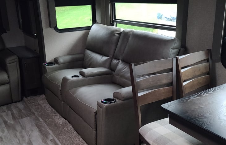 Double recliner with heat/massage features