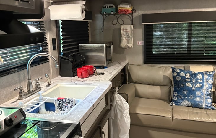 Kitchen area & couch.