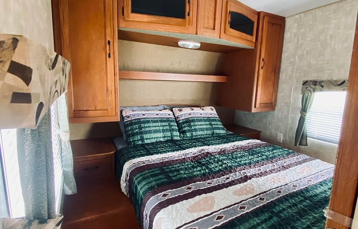 Master queen bedroom area. Doors do close and the main room TV can be rotated around to the master bedroom area.