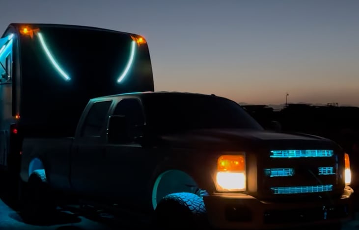 We pulled out all of the stops on this rig! Full surround lighting that sinks with the truck for a real campground show stopper.