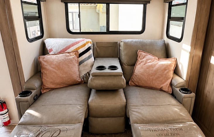 Put your feet up + stay awhile. Two cozy reclining chairs give you a comfortable place to unwind, read, watch a movie or take in the view after a full day outside.