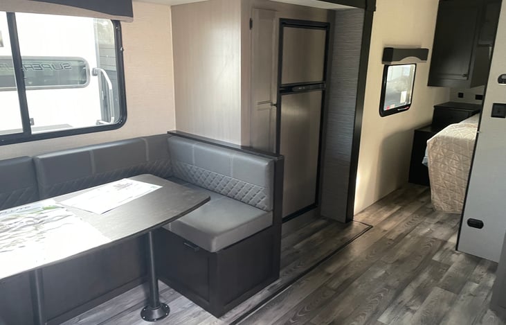 Fridge with large round table seating area