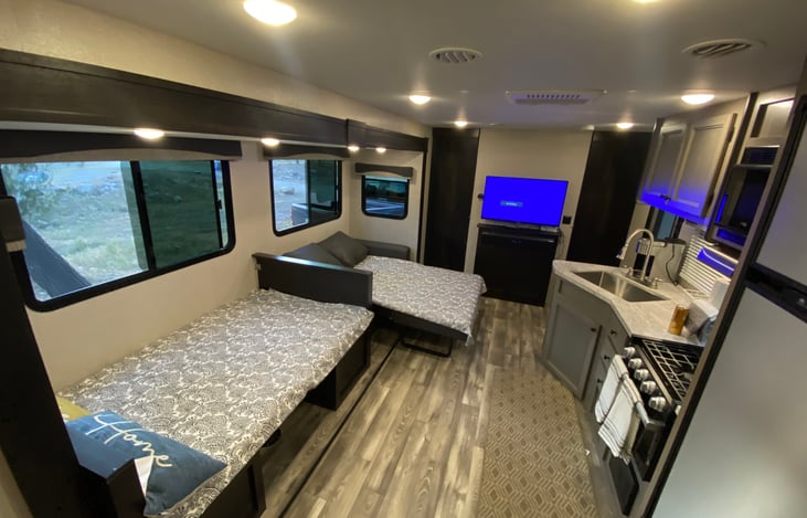 Sleep set up and kitchen. Spacious living space