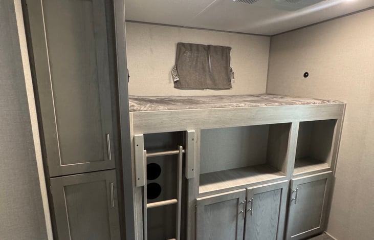 Bunk bed with TV hook up below it