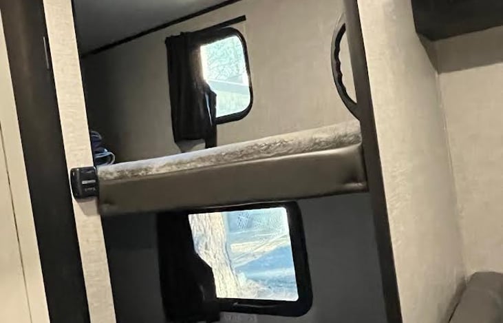 Two single bunks with windows if you want to bring the kids along