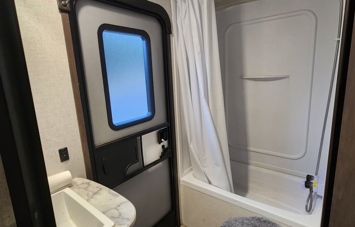 bathroom with separate outside entrance