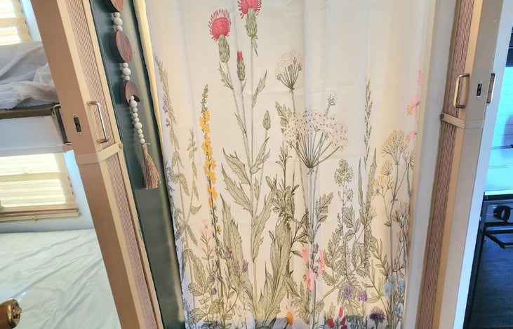 The shower can be closed off using the tan doors you see on either side of the shower. They snap into place. WE also have shower gels, towels, rags, and stuff in the bathroom, just in case you forget.