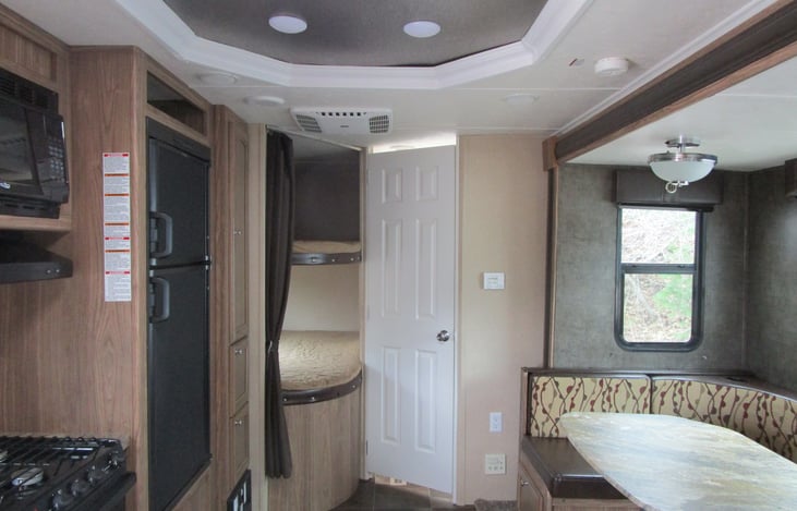 Bath door and bunks.