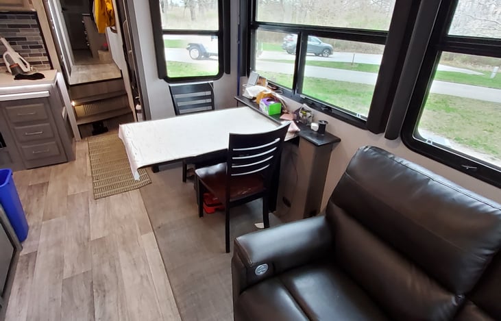 Two recliner chairs   Dinning table with 4 chairs.