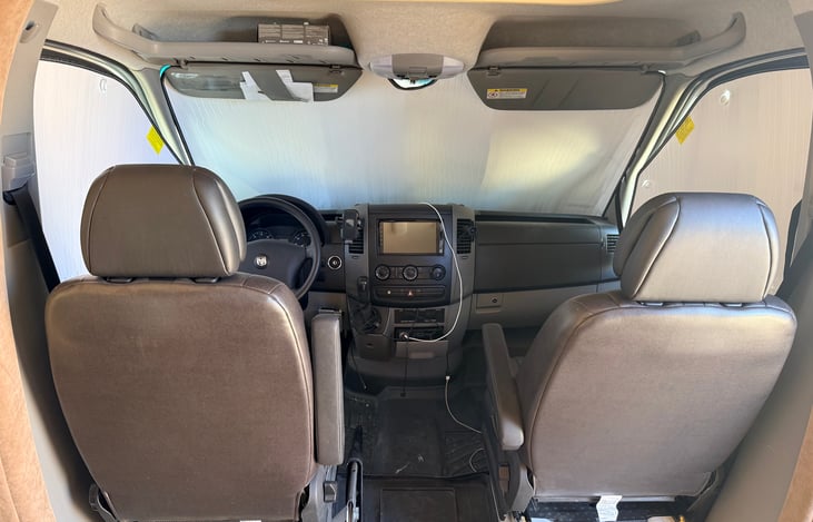 Cab with privacy shades in place—adds comfort, keeps it cool, and gives you a little extra privacy when parked 🚐🪟