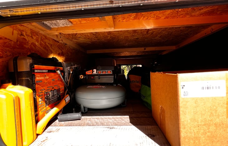 Add on: 3 gallon pancake Air Compressor; Always a good idea to have extra air. 

Additional leveling blocks, hoses, tools, small splitting axe, shovel, 10w-30 oil, tire chains, and a jack.