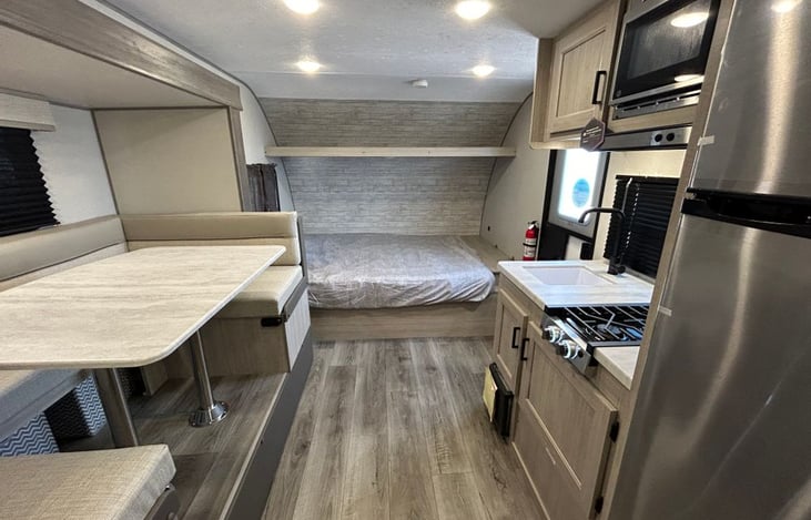 Queen mattress with overhead storage