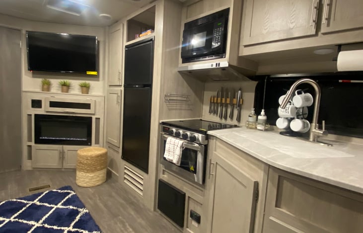 Lil chefs kitchen ... call Gordon Ramsey ... lets go!
I should have turned on the fire-place for ambiance?
fire-place has remote/control temp. puts out amazing heat!