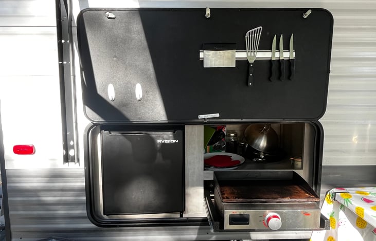 outdoor fridge and flat top grill