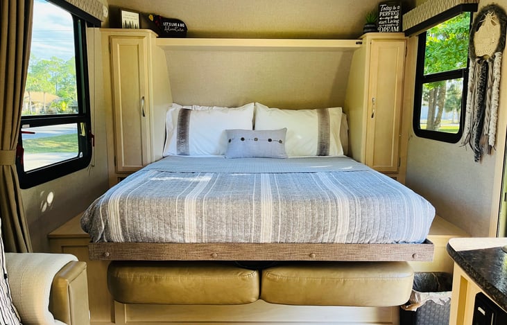 Murphy bed with  couch under for more additional seating.