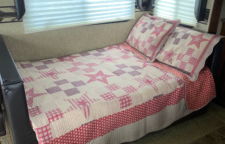 Dining Area Bed Conversion ( makes into double/sleeps 2)  Fresh laundered sheets, light weight comforter and pillows included.