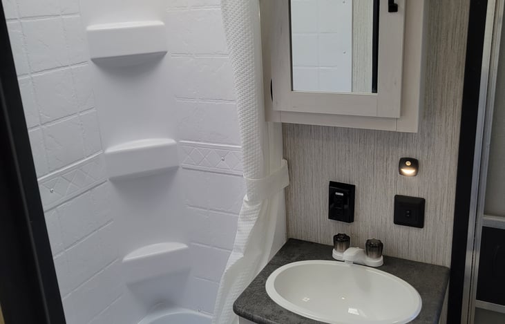 You can't see it but we updated the shower head as well so there's actually great water pressure without using too much water!