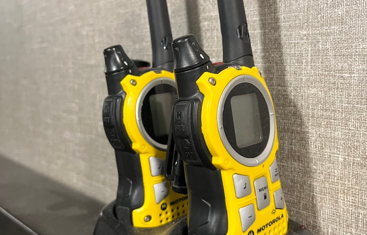 Two-way radios (included) are handy when backing into your spot with a partner who can spot you.