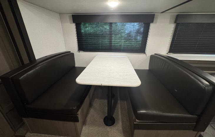 Dinette area for meals, games, or extra sleeping space