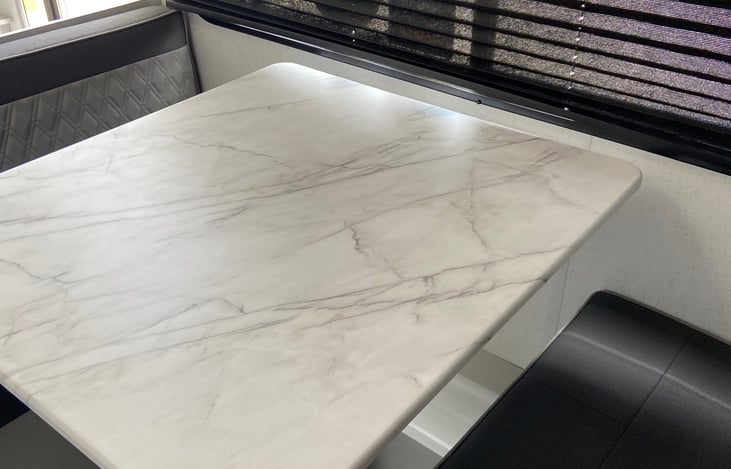 Dining area that converts into a bed