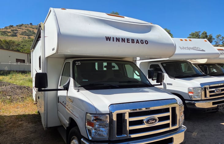 Front view with side entrance and awning (rolled up).