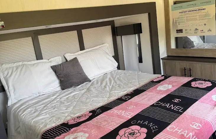 Camper King bed. Also with projector to watch tv or play games!