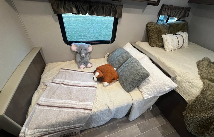 Dinette makes a bed for two kids.