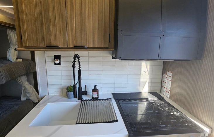 Farm sink with 3 burner stove, oven and microwave oven