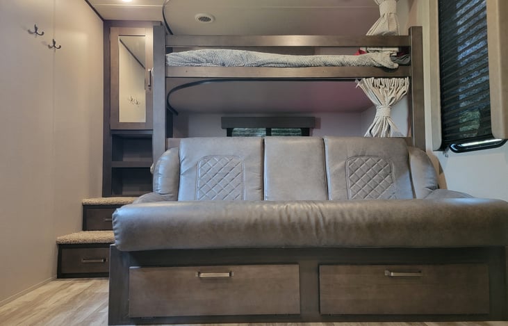 Jack-knife couch and bunks