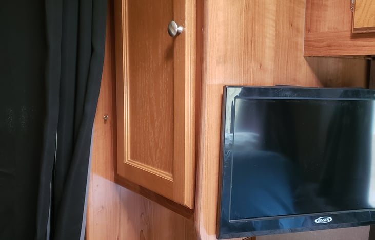 TV in the back bedroom.