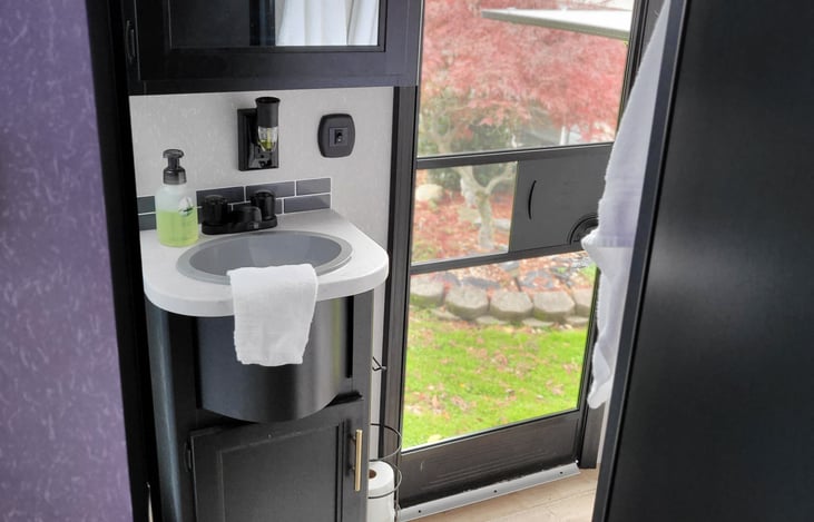 Bathroom has an entrance from the outside